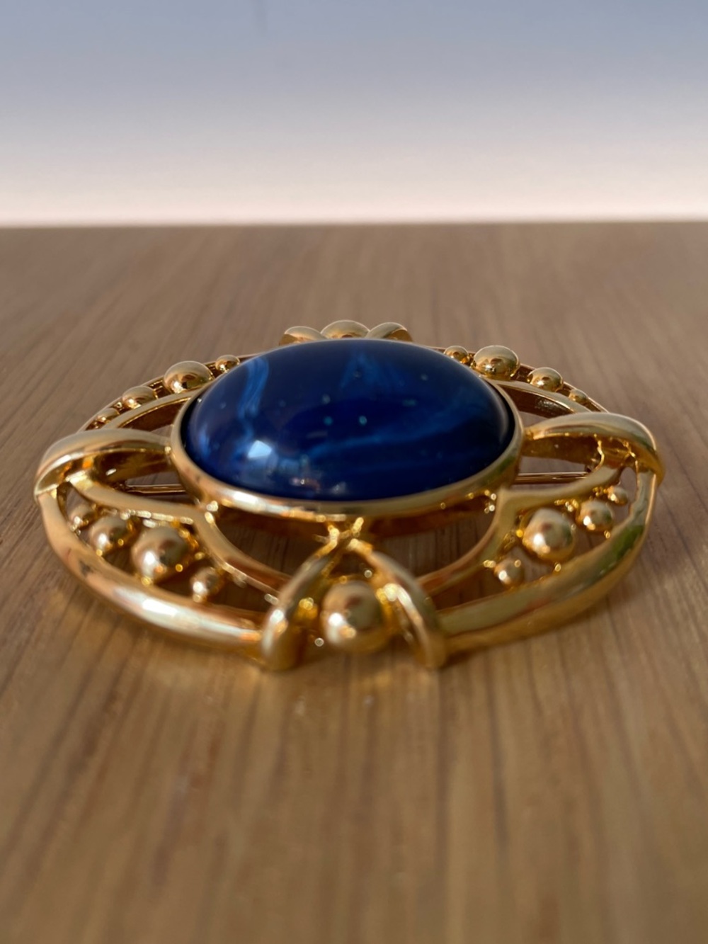 Vintage Gold-Tone Brooch with Deep Blue Galaxy Cabochon